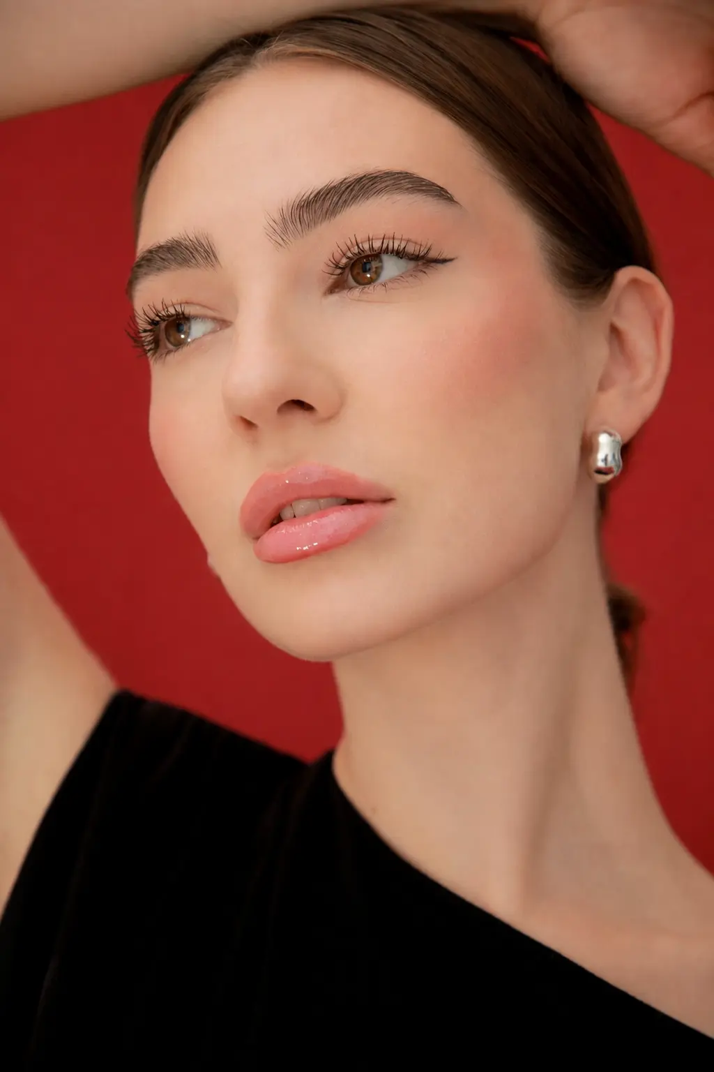Martyna Jablonski — beauty portrait on burgundy background